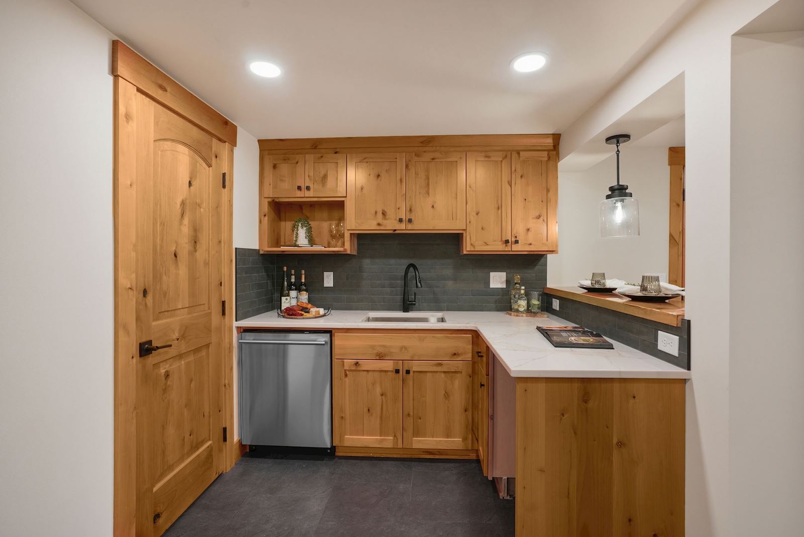Downstairs kitchenette with bar seating at 13827 E 46th Ave in the Spokane Valley area of Spokane, WA 99206.