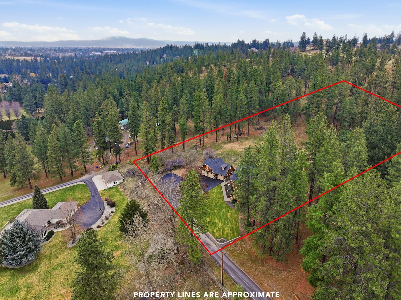Acreage setting at 13827 E 46th Ave in the Spokane Valley area of Spokane, WA 99206.