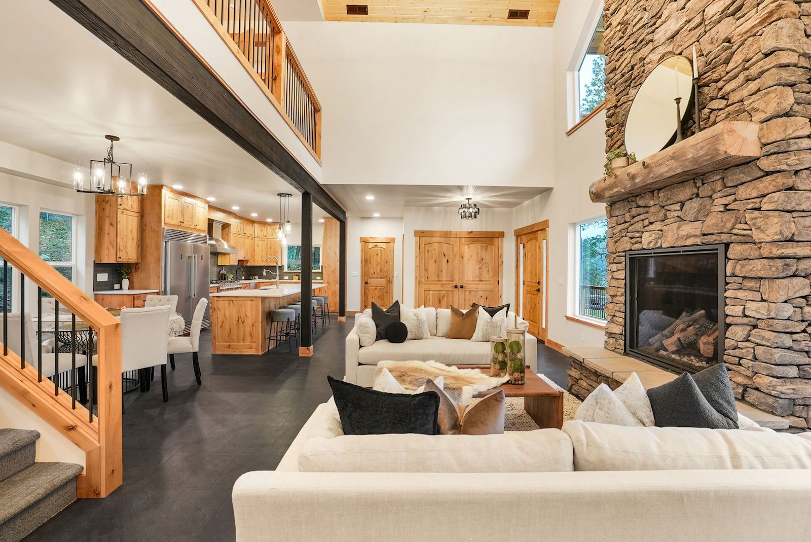 Open-concept living room with fireplace at 13827 E 46th Ave in the Spokane Valley area of Spokane, WA 99206.