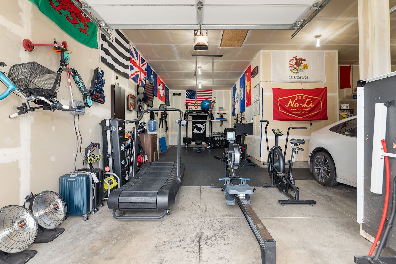 Interior 4-car garage space at 7132 S Pheasant Ridge Dr in Eagle Ridge Spokane WA with room for gym or storage use.