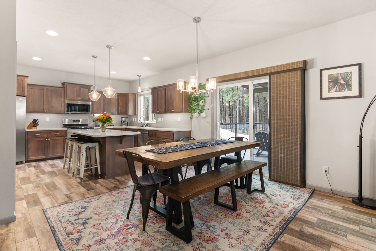 Open-concept dining room and kitchen at 7132 S Pheasant Ridge Dr in Eagle Ridge Spokane WA.