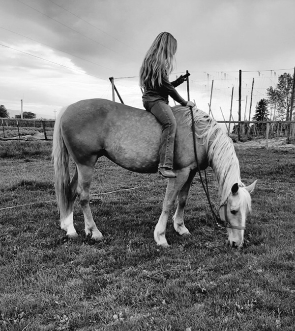 Amy Allred riding a horse