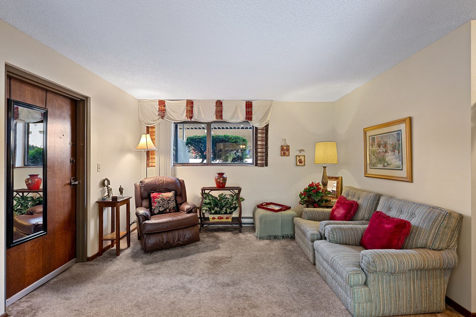 Living Room at 13223 E 29th Ave Unit 2, Country Village 55+ Community, Spokane Valley WA. Listed by Team Dailey.