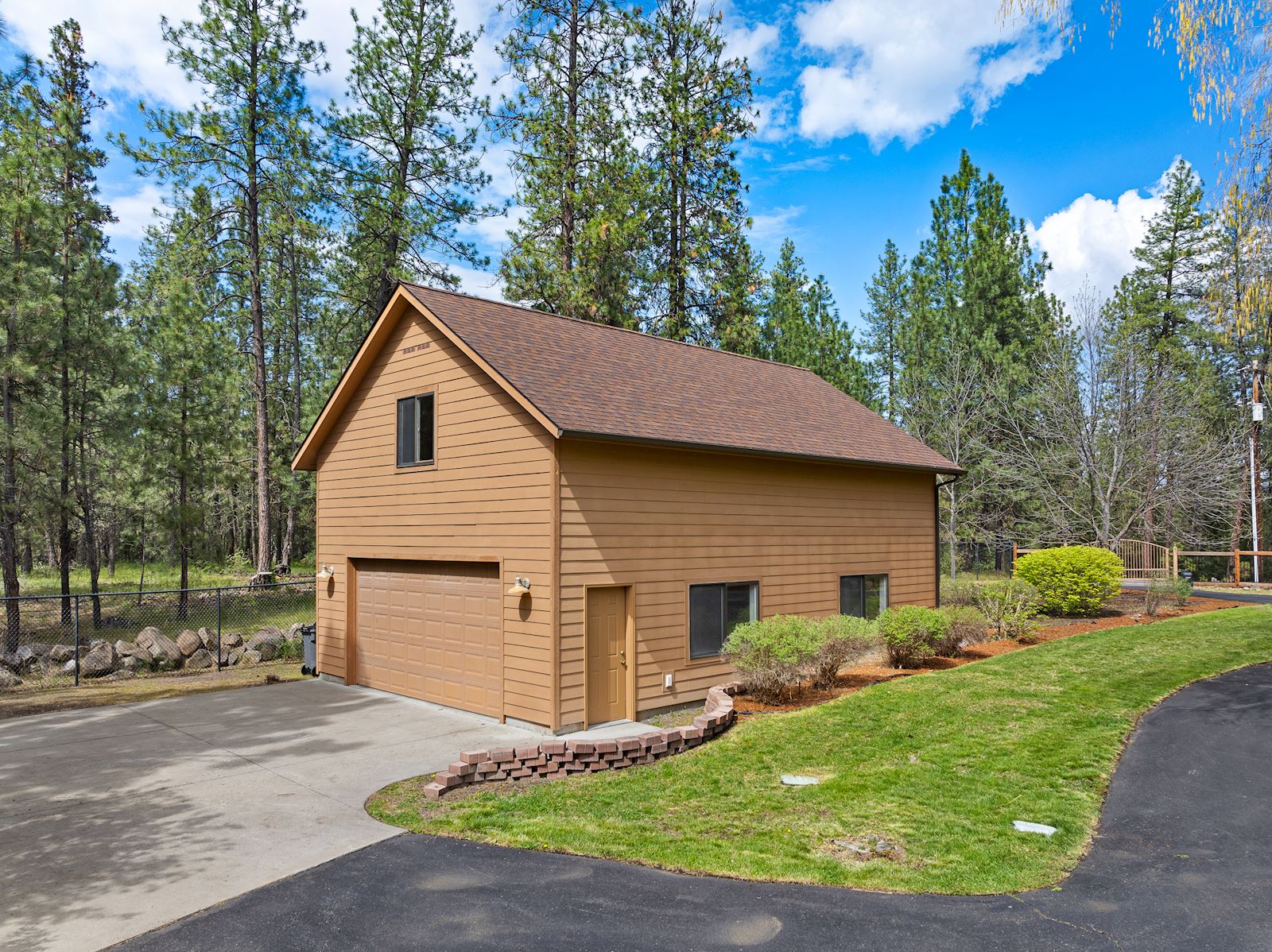 Exceptional 24x36 heated shop with loft space on the 12.4-acre luxury property in Nine Mile Falls WA 99026