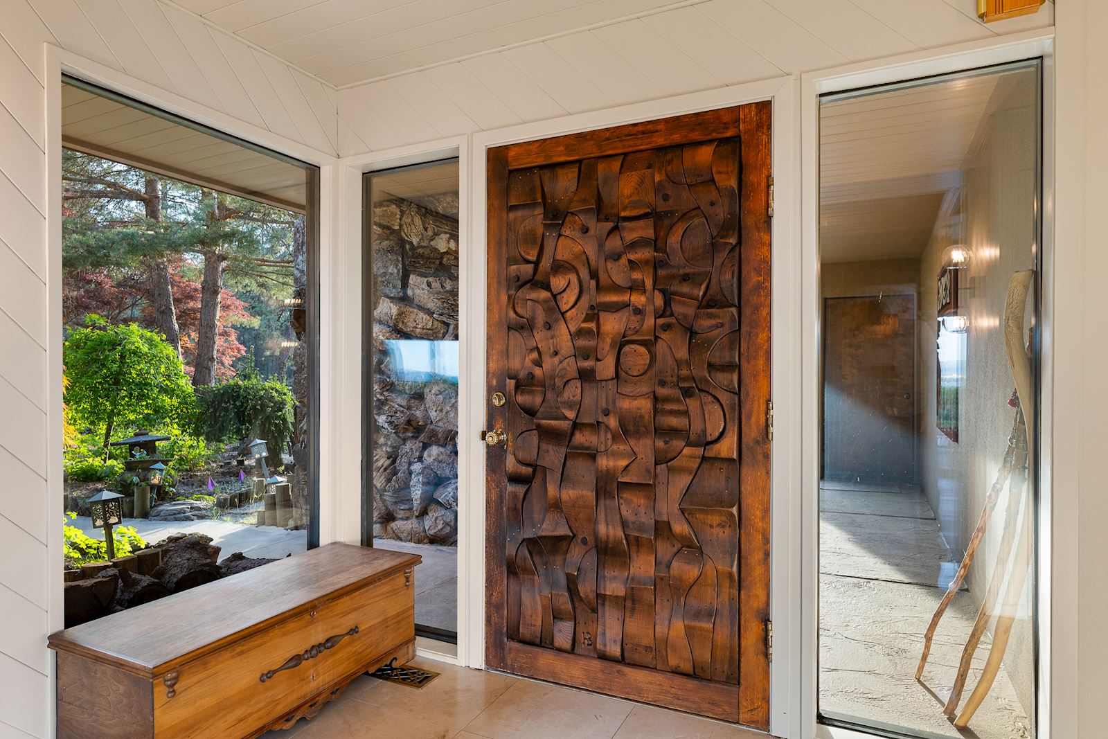 Original Harold Balazs interior door artwork at the 99224 Spokane luxury estate