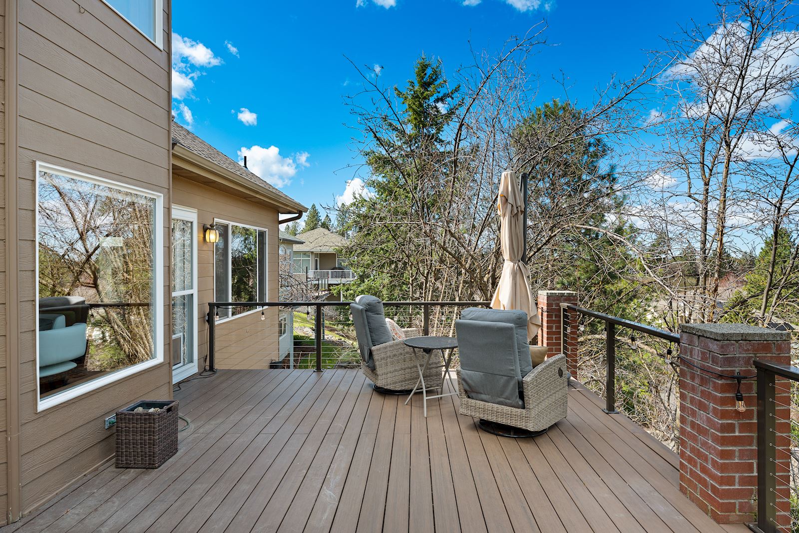 Expansive top-level Trex deck perfect for entertaining at the Gleneagle luxury home