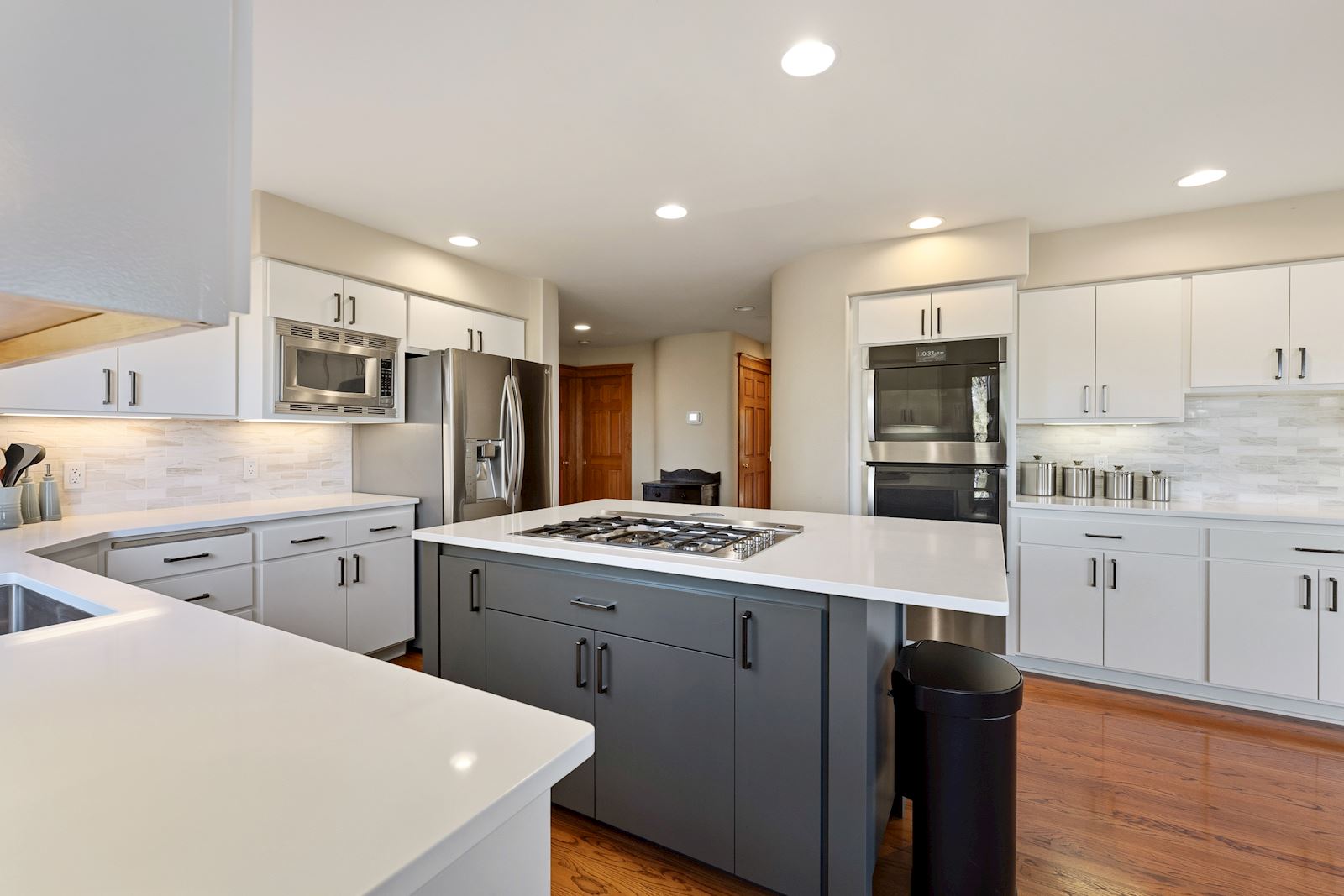 Updated chef's kitchen featuring a new gas range at the Gleneagle South Hill property