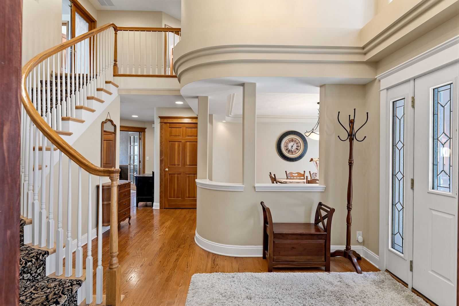 Grand entry stairway inside the custom dual-living estate at 4805 E Gleneagle Ln, Spokane