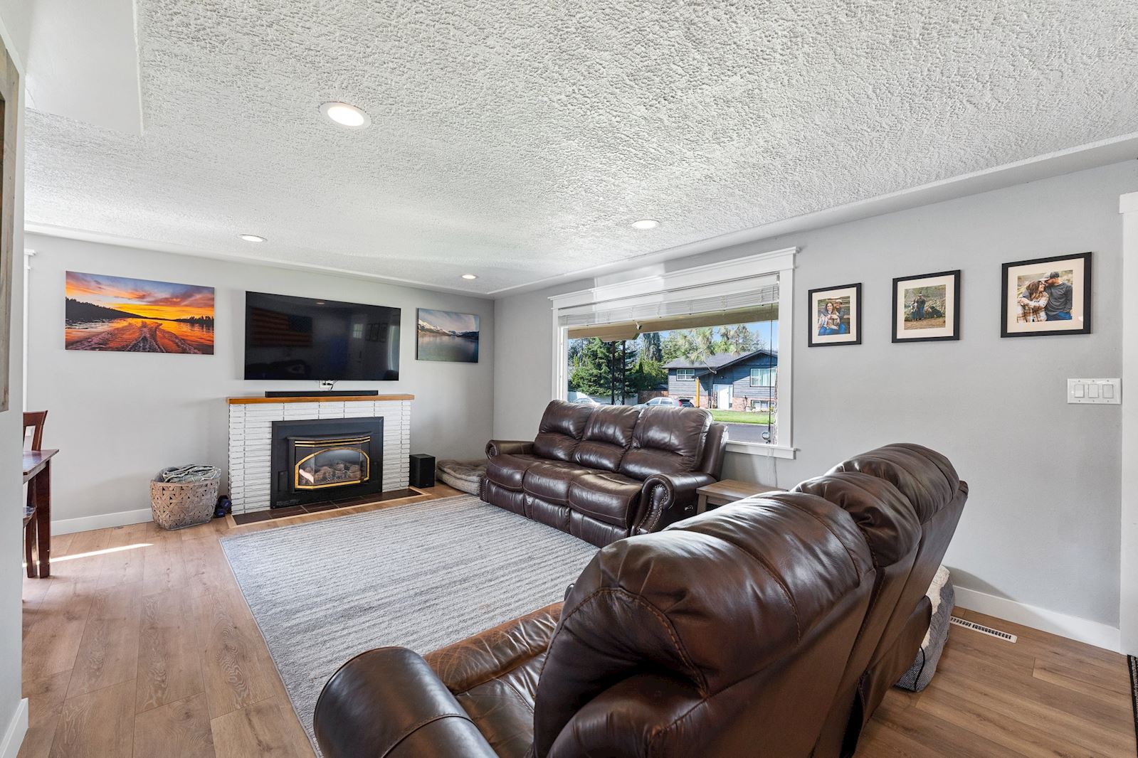 Bright and open main living room at 6516 N Hartley St in North Spokane WA 99208. Real estate listing by Team Dailey | John L. Scott Real Estate.