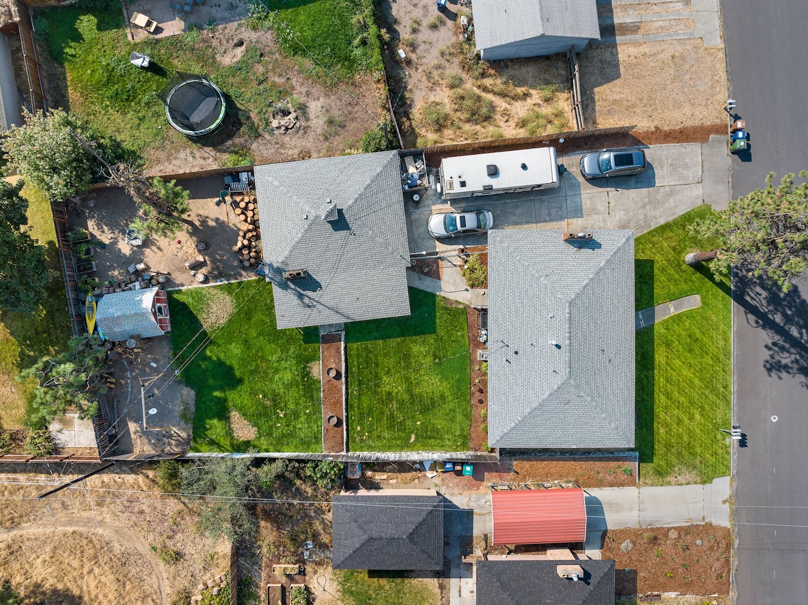 Exterior bird's-eye aerial view of 6516 N Hartley St in North Spokane WA 99208. Real estate listing by Team Dailey | John L. Scott Real Estate.