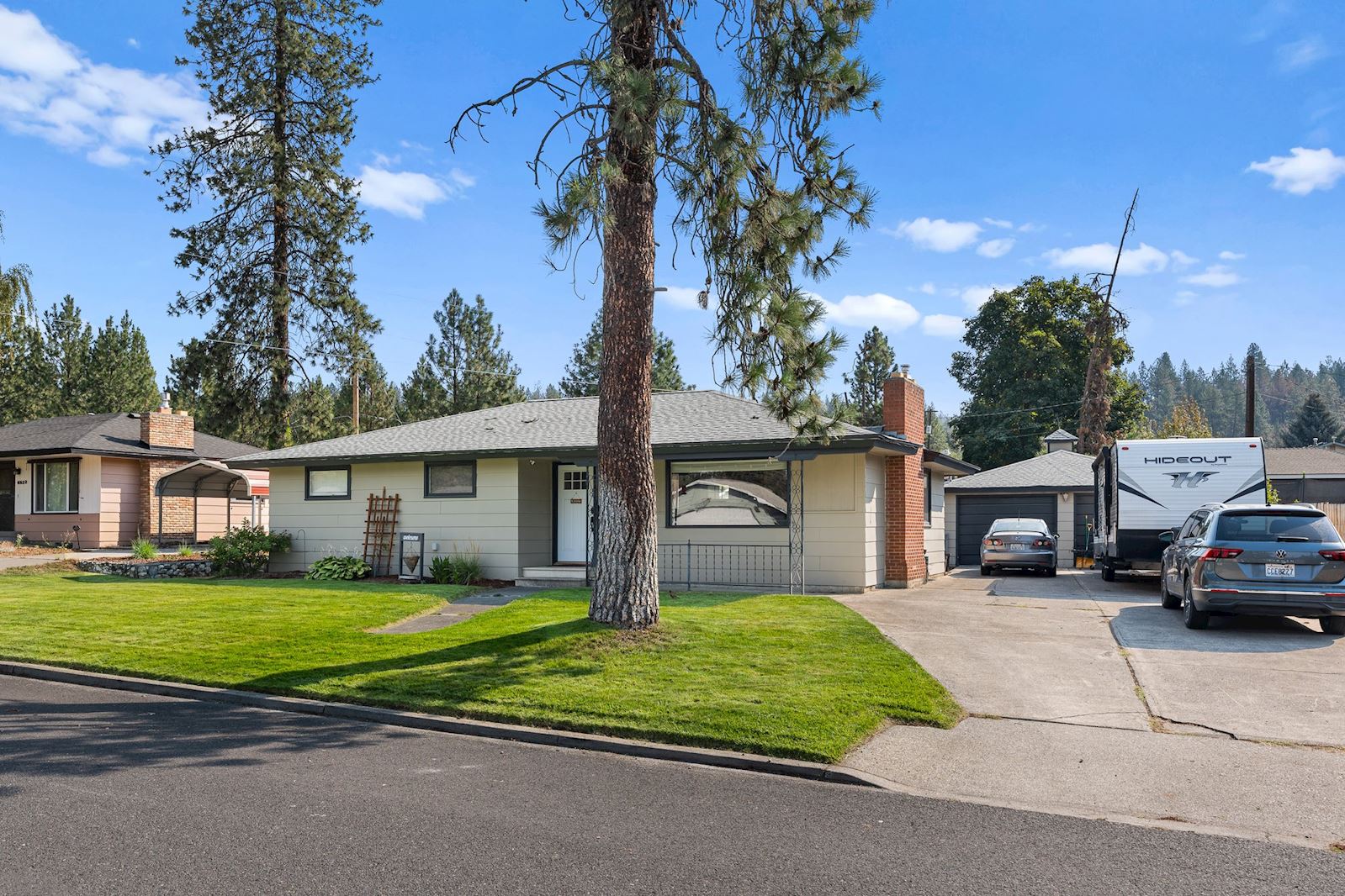 Front exterior of 6516 N Hartley St in Spokane WA by Team Dailey
