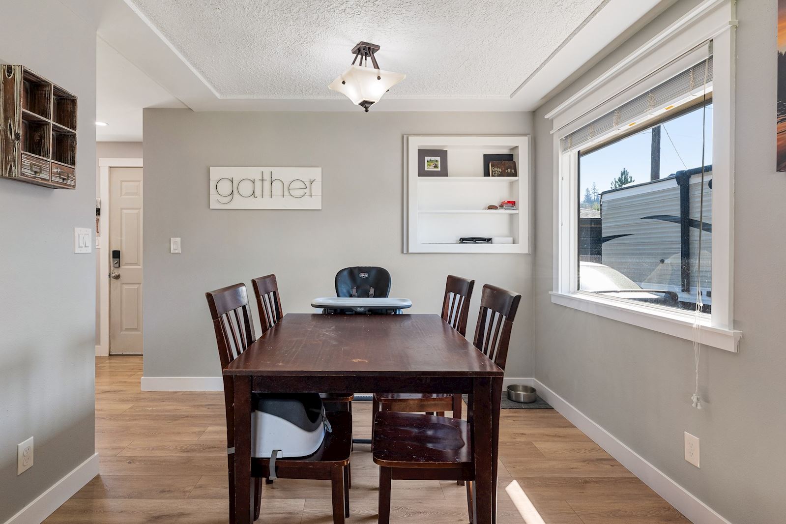 Updated dining area at 6516 N Hartley St in North Spokane WA 99208. Real estate listing by Team Dailey | John L. Scott Real Estate.