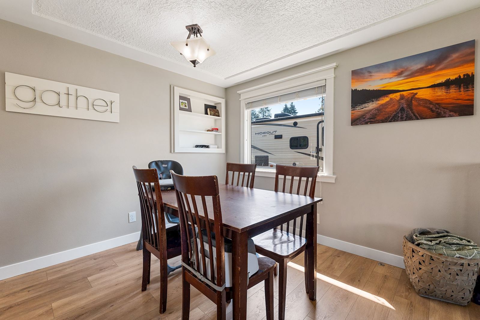 Updated dining room at 6516 N Hartley St in North Spokane WA 99208. Real estate listing by Team Dailey | John L. Scott Real Estate.