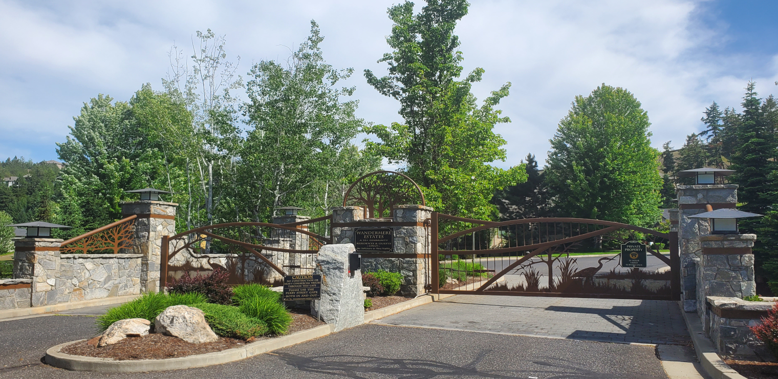The secure gated entry to Wandermere Estates in North Spokane, WA 99208. Real estate expertise and neighborhood insights provided by Kimberly & Daniel Dailey of Team Dailey.