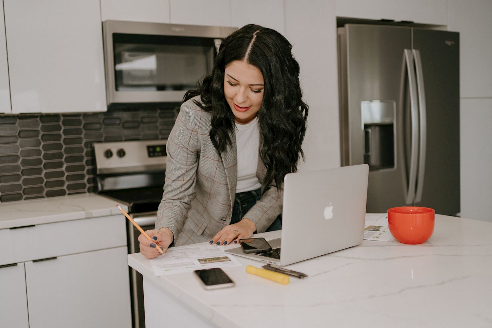 Sarah Aguirre preparing real estate paperwork