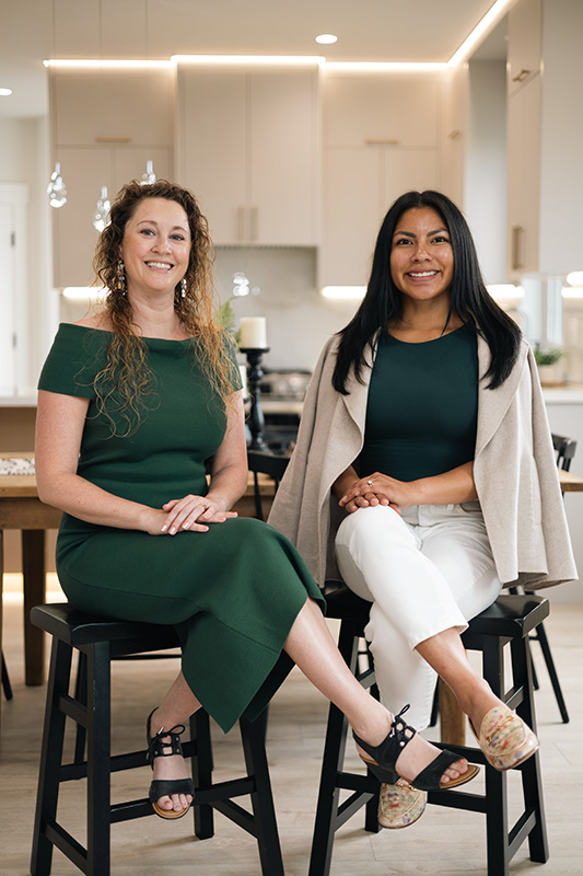 Photo of Mira Gregory and business partner.