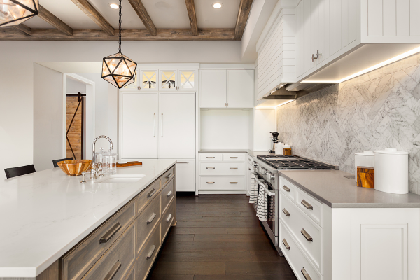 Inside of a kitchen with an island