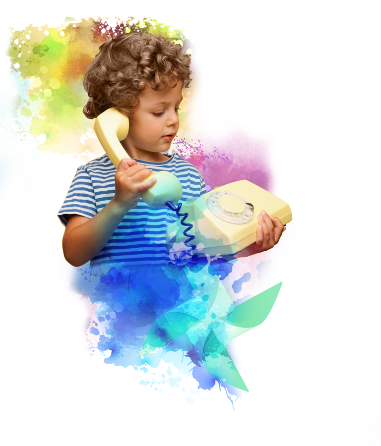 Child blowing a colorful pinwheel