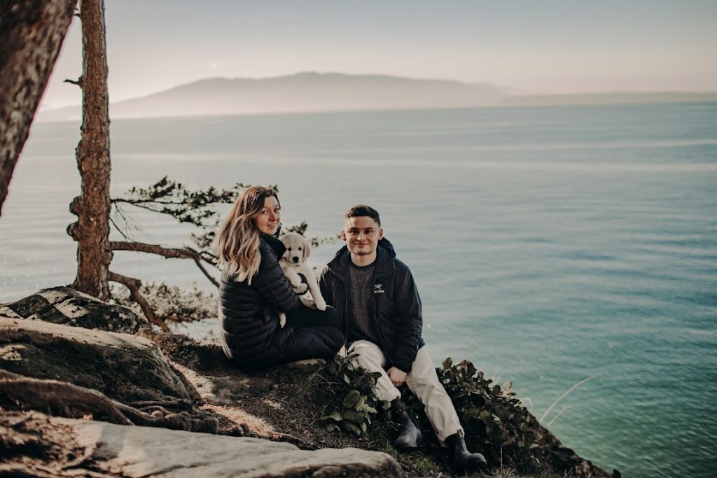 Coastal overlook with the couple and their dog
