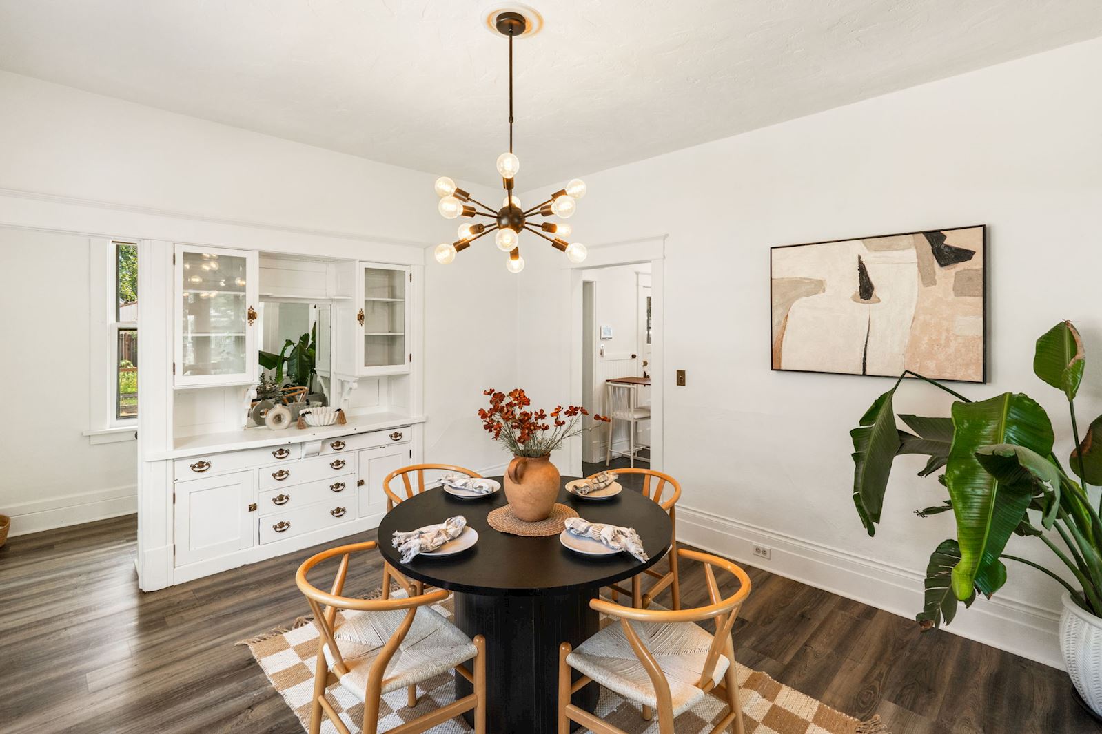 Previous listing: Dining room with built-in cabinetry and a round dining table